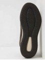 Botas Skechers Delson Selecto waterproof, modelo 65801 choco, color marron, vista suela